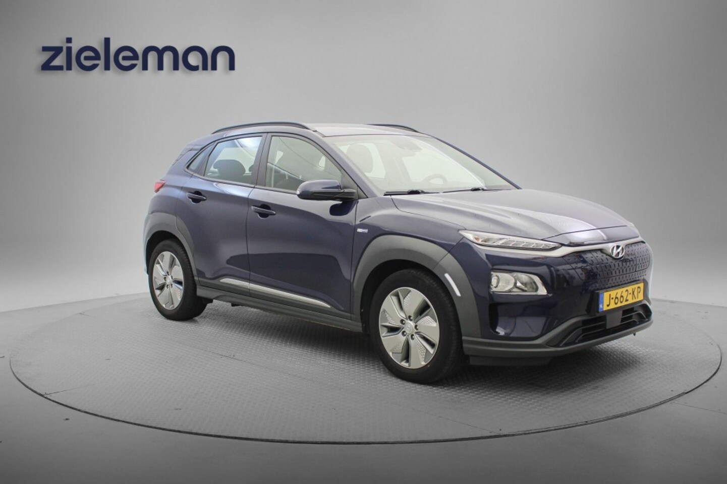 Hyundai Kona Electric - Comfort 64 kWh - Carplay, Camera, Navi, Cruise, Clima - AutoWereld.nl