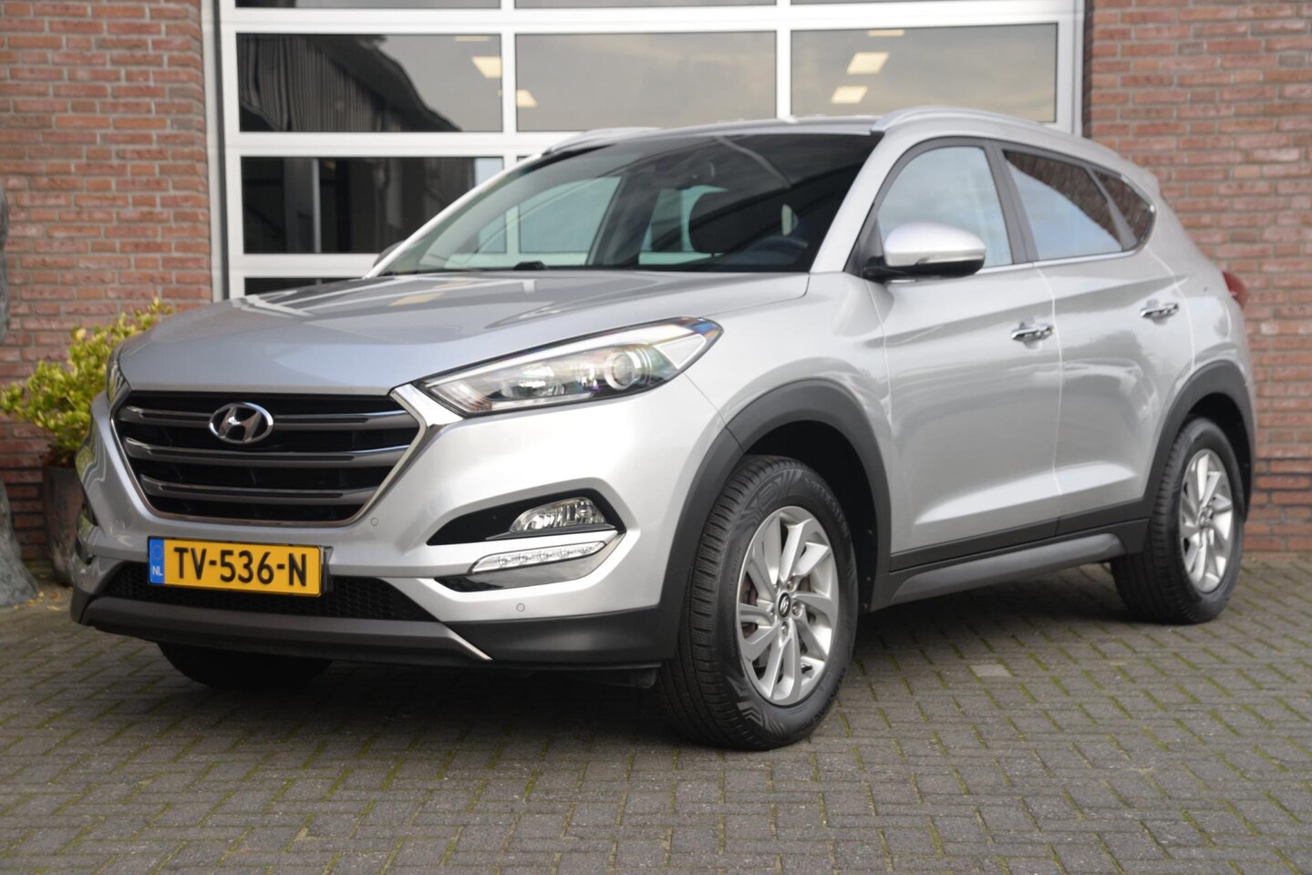 Hyundai Tucson - 1.6 GDi Premium | Leder | Camera | Afn. Trekhaak | - AutoWereld.nl