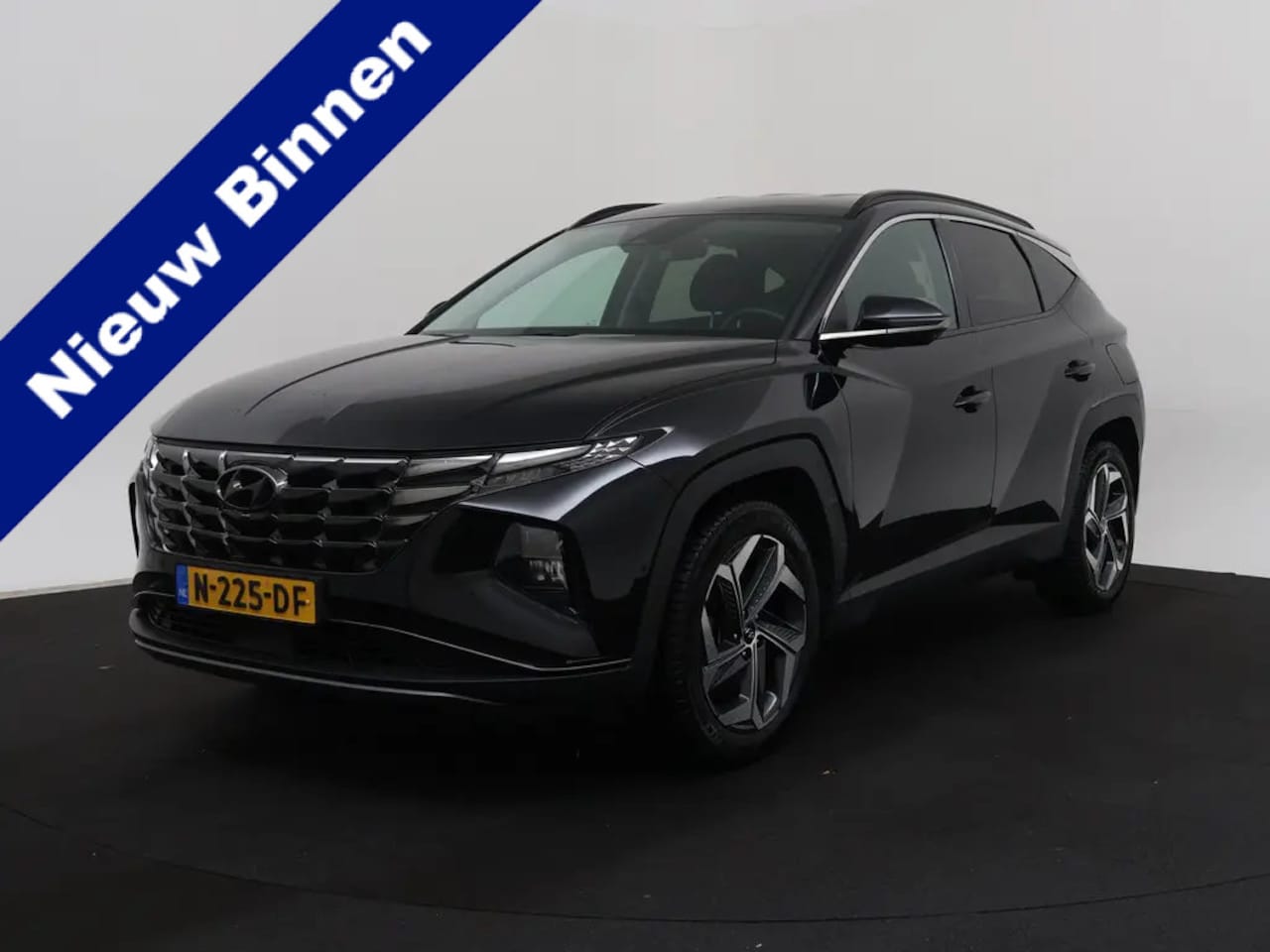 Hyundai Tucson - 1.6 T-GDI HEV Premium 5-drs SUV | Leder | 09-2021 86.925 KM - AutoWereld.nl