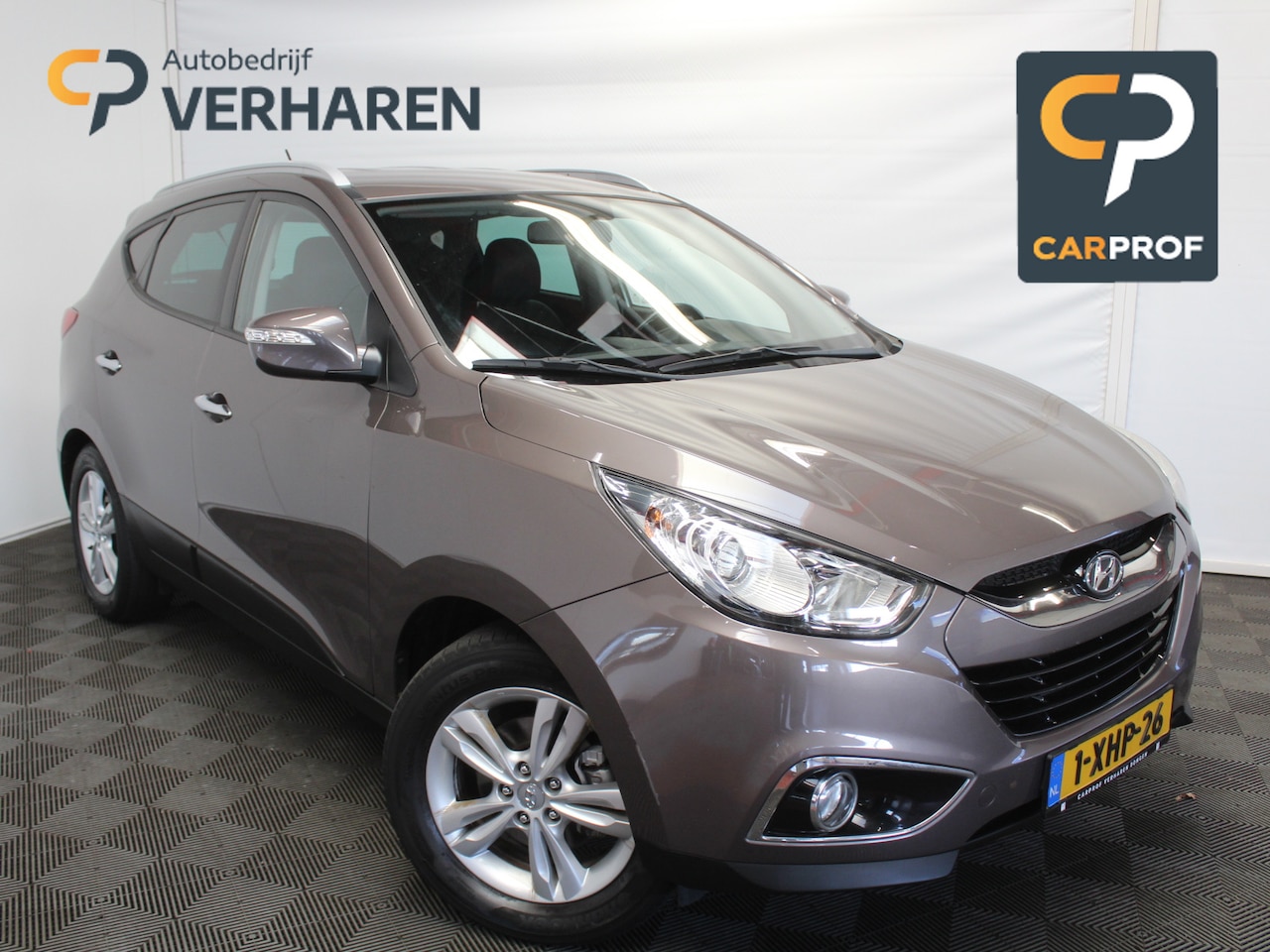 Hyundai ix35 - 1.6i GDI Style CRUISE | CLIMATE | LEER | TREKHAAK | PDCA | STOELVERW | LMV17 - AutoWereld.nl