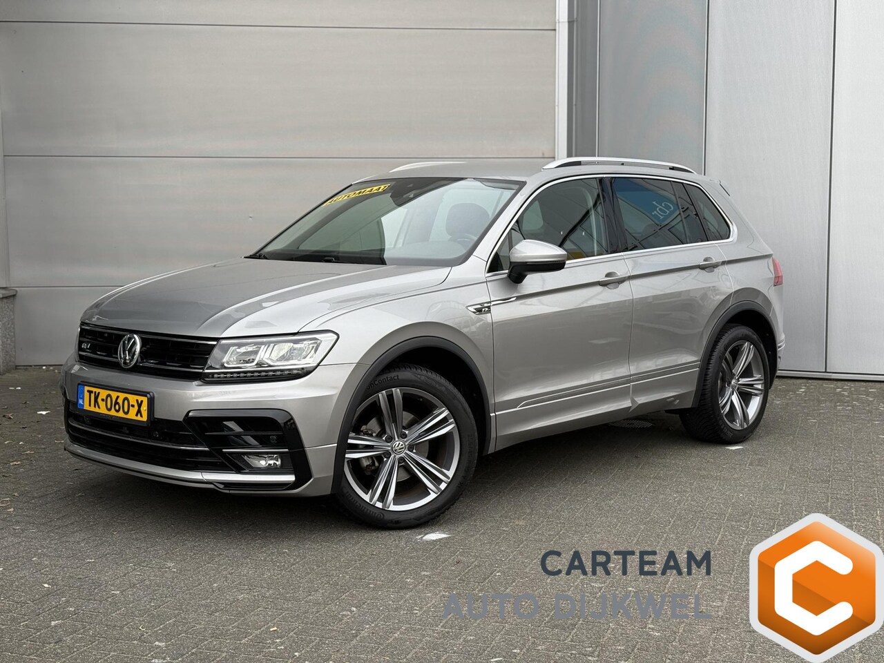 Volkswagen Tiguan - 1.4 TSI 4Motion Highline R-line , Leder, 2000kg trekgew. - AutoWereld.nl
