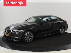 BMW 3-serie - 318i M Sport | 26.200km NAP | Trekhaak | Stoelverwarming | Camera | Sfeerverlichting | Car