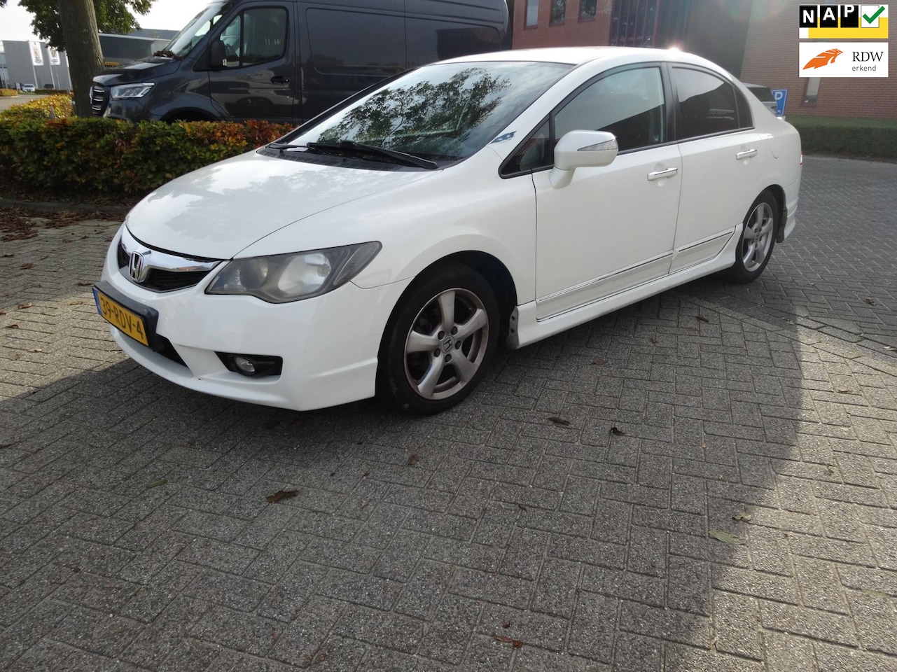 Honda Civic - 1.3 Hybrid Elegance Airco Navi Leer Apk 18-9-2026 - AutoWereld.nl
