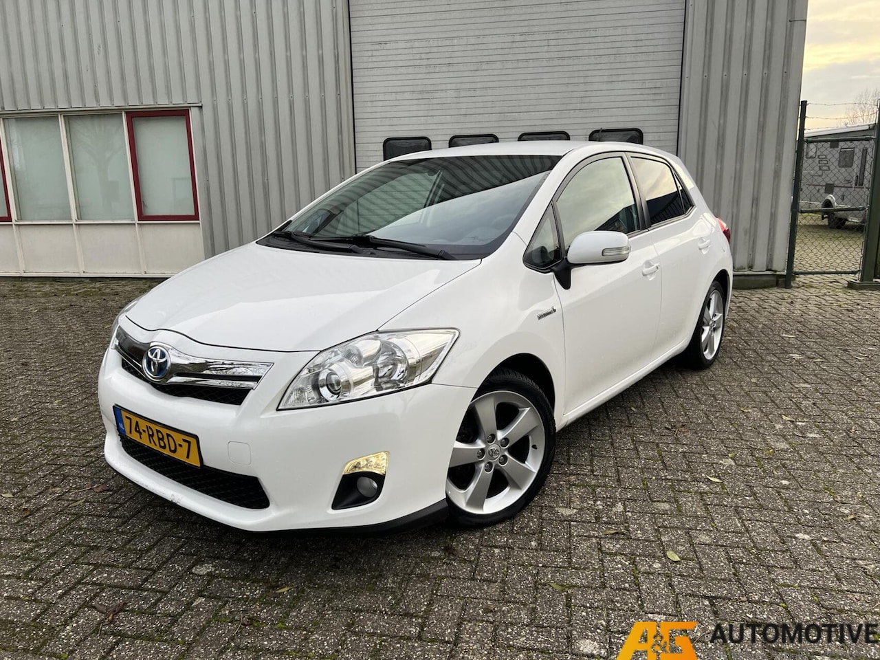 Toyota Auris - 1.8 Full Hybrid Executive 2011 - AutoWereld.nl