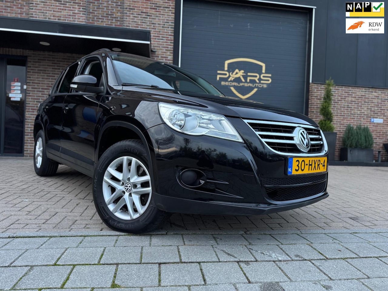 Volkswagen Tiguan - 2.0 TDI 140PK 4Motion Youngtimer Comfort&Design Airco Navi Cruise Elk.Ramen Trekhaak - AutoWereld.nl