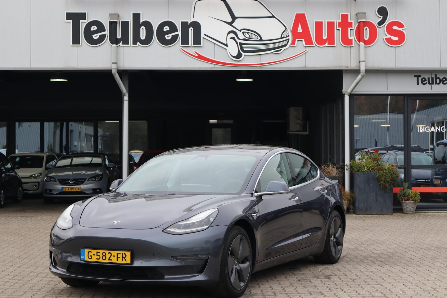 Tesla Model 3 - Long Range RWD Long Range AWD 75 kWh 90% SOH, Panoramadak, Lederen interieur, 360 Camera, Trekhaak - AutoWereld.nl