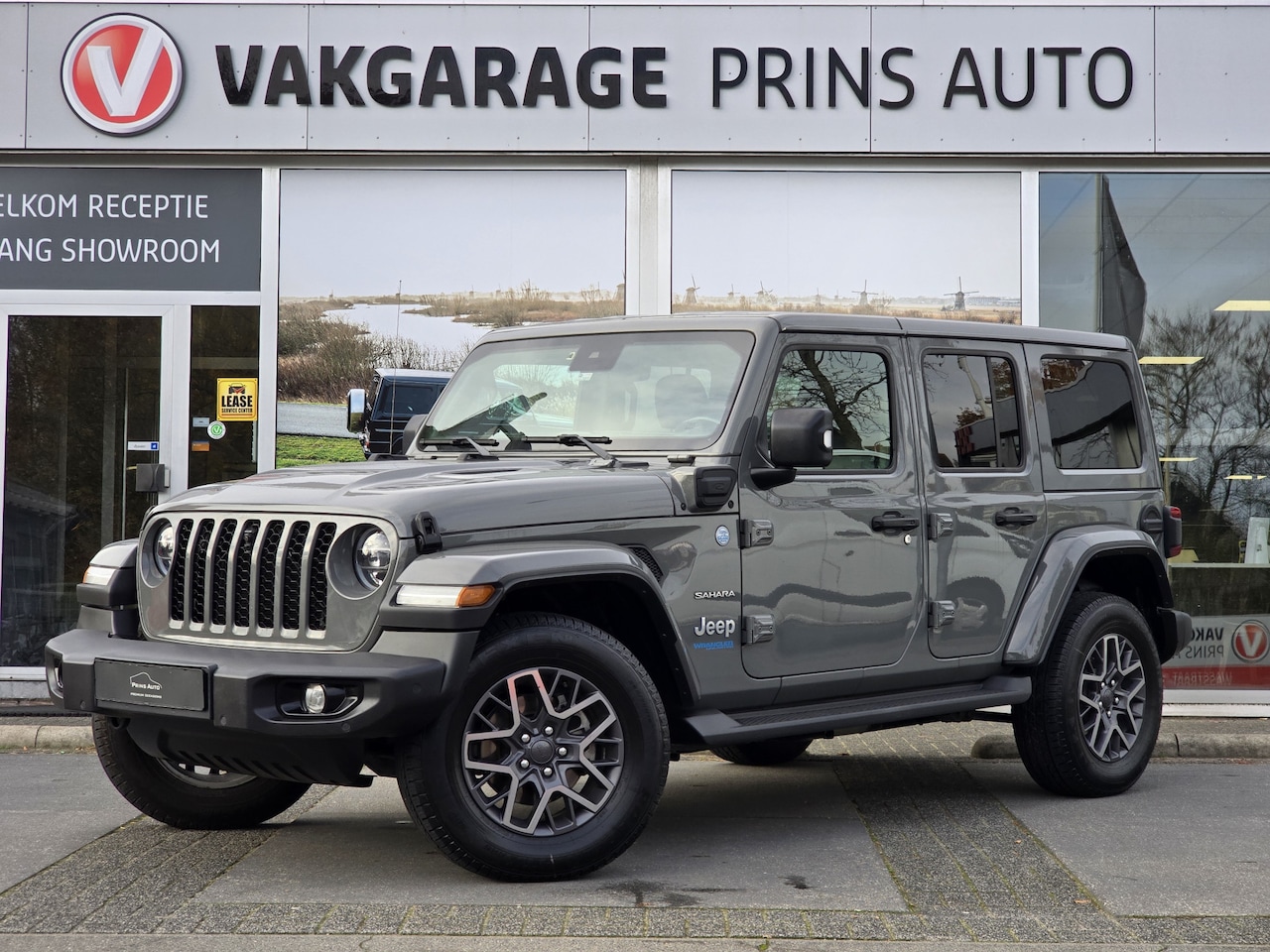 Jeep Wrangler Unlimited - 4xe 380 Sahara |STING GREY|STOEL+STUURVERW.|CAMERA V+A| 3904 - AutoWereld.nl