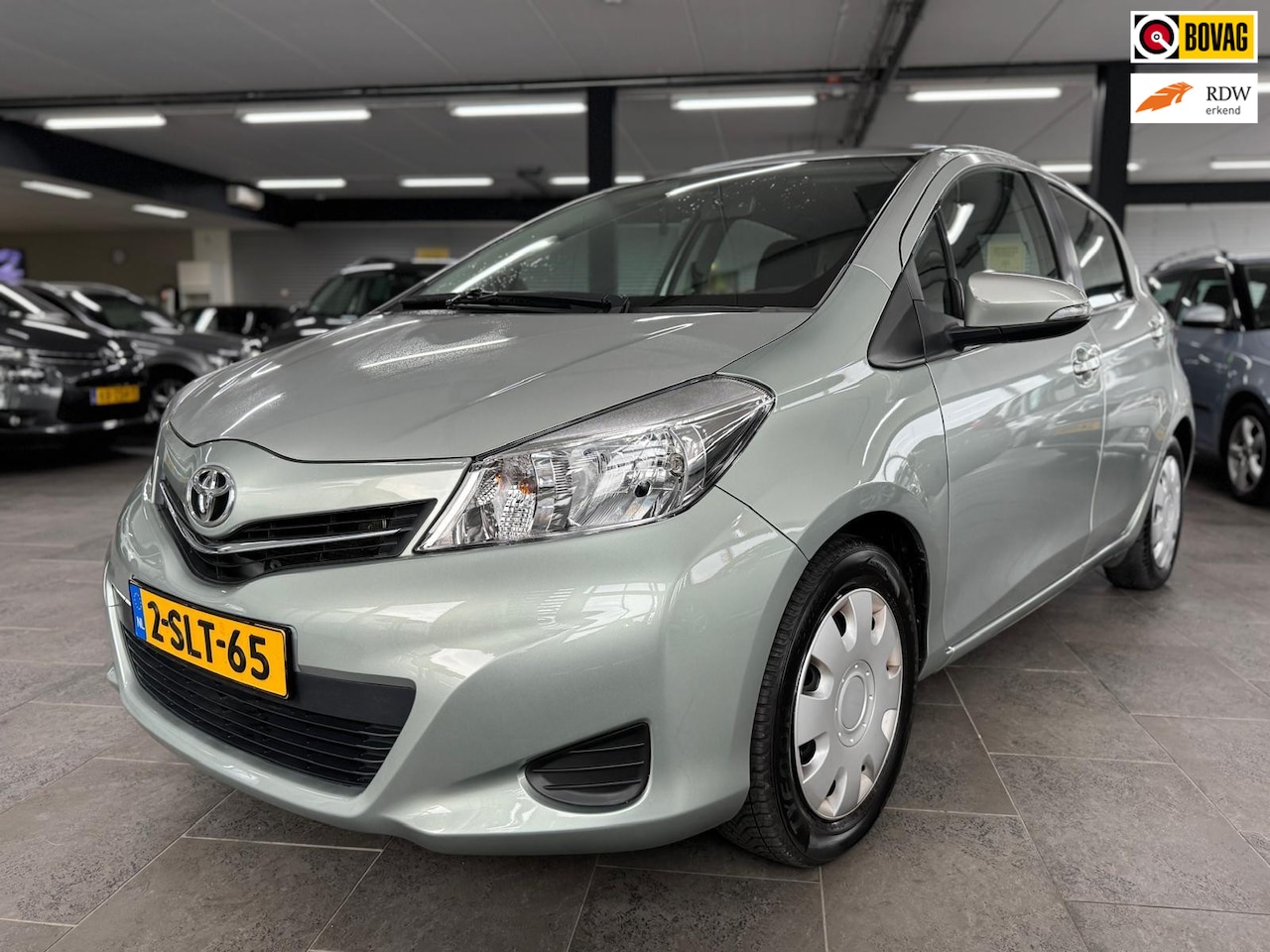Toyota Yaris - 1.3 VVT-i Aspiration navigatie camera airco elektrische pakket trekhaak - AutoWereld.nl