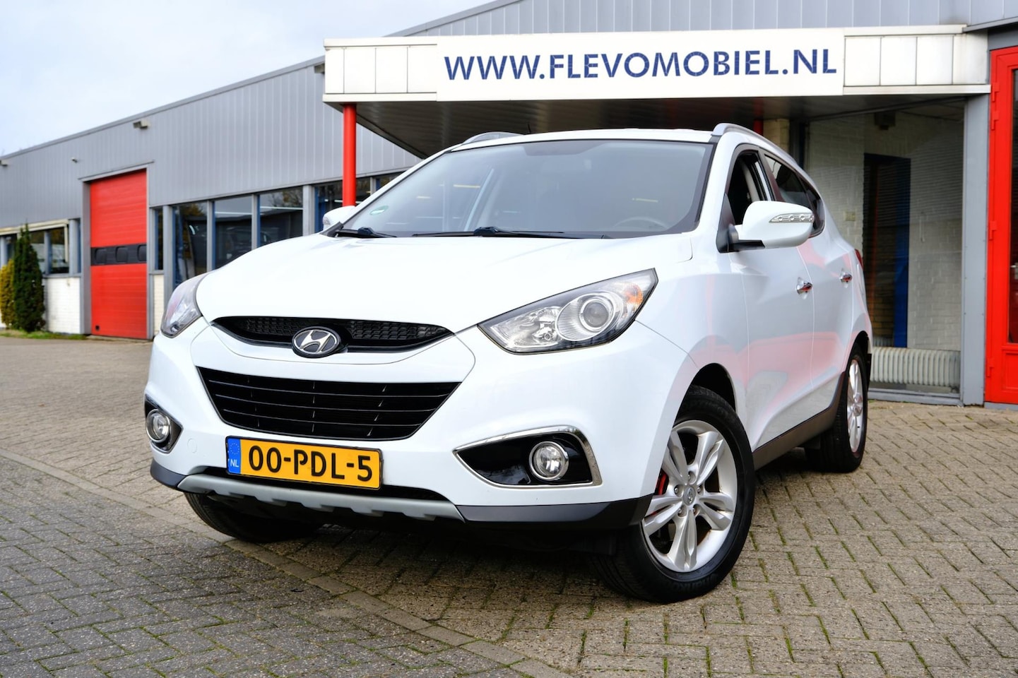 Hyundai ix35 - 2.0i 163pk Style Navi via Android|Half Leder|Cam|Clima|LMV - AutoWereld.nl