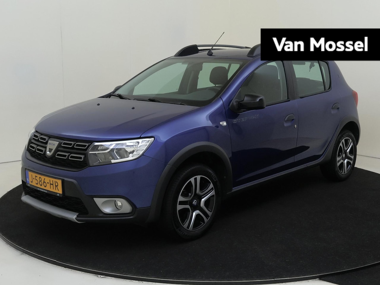 Dacia Sandero Stepway - 1.0 TCe 100 PK Bi-Fuel Stepway SL 15th Anniv. Navigatie | Climate Control | Camera | Parke - AutoWereld.nl