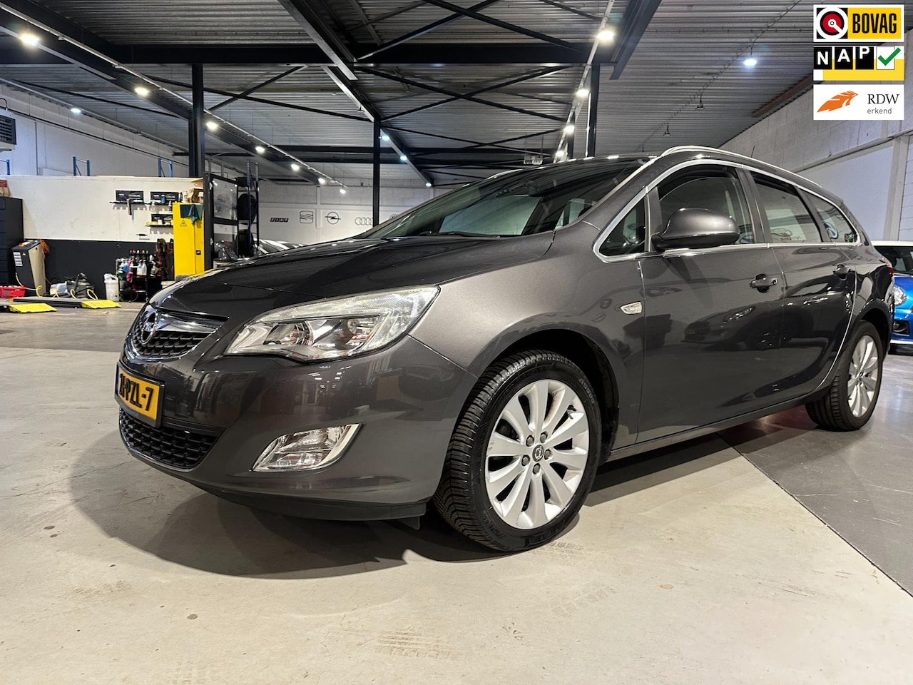 Opel Astra Sports Tourer - 1.4 Turbo Cosmo/Dealer onderhouden/Apk nw bij aflevering - AutoWereld.nl