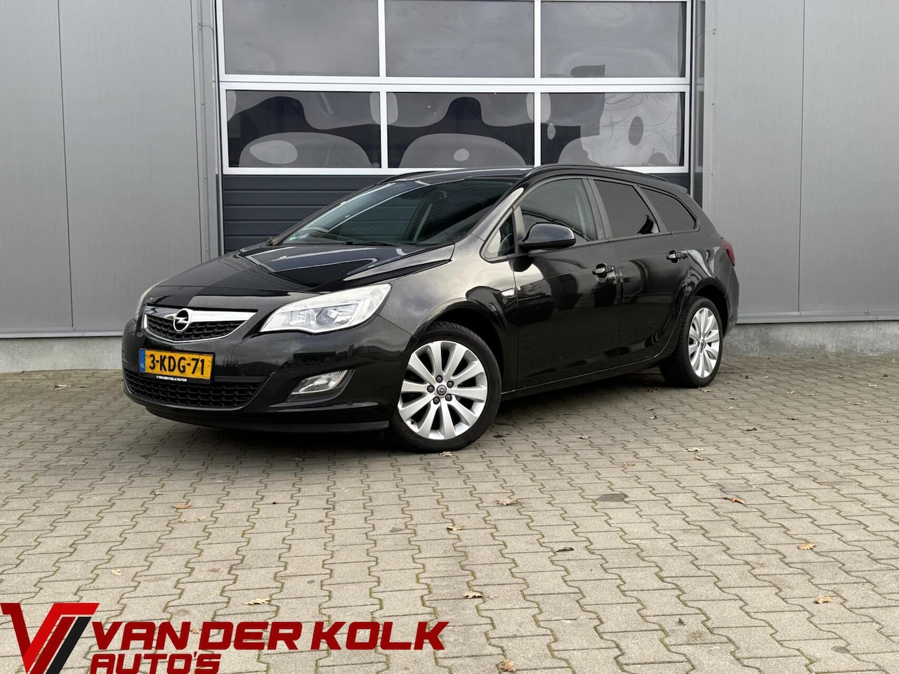 Opel Astra Sports Tourer - 1.4 Turbo Business Half Leder Navigatie Cruise Trekhaak Airco - AutoWereld.nl