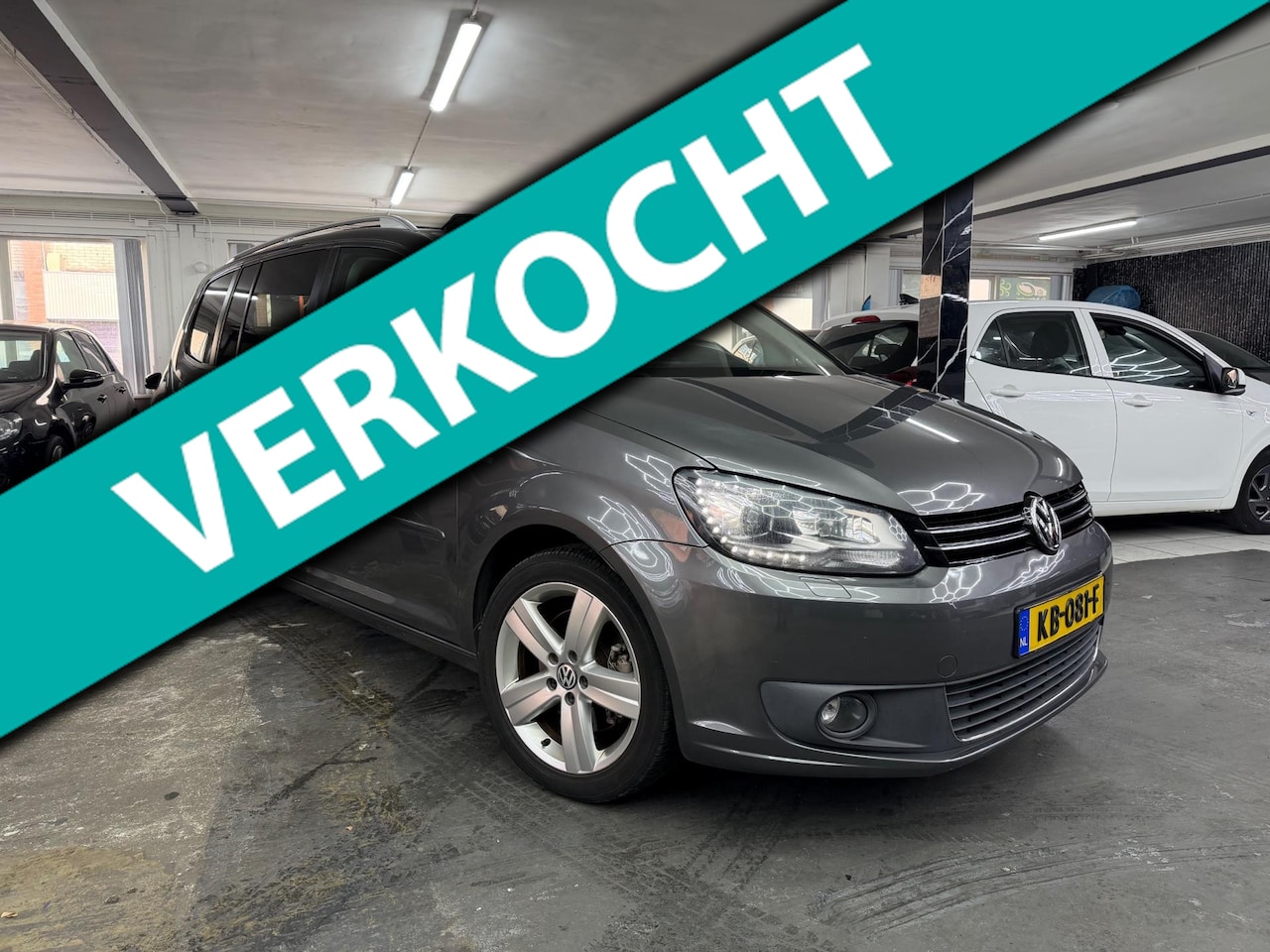 Volkswagen Touran - 1.4 TSI Highline Automaat/Pano vol opties - AutoWereld.nl
