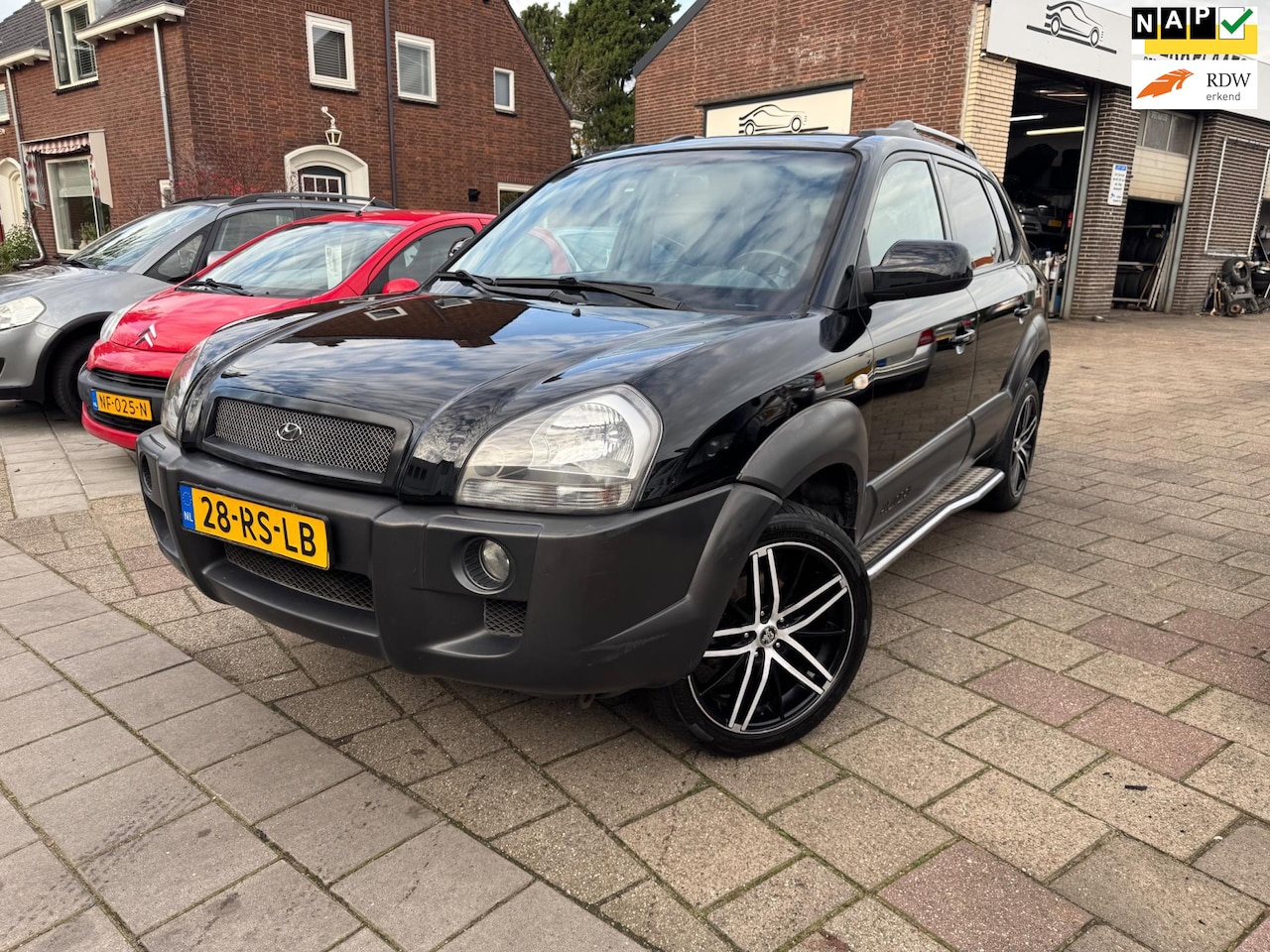 Hyundai Tucson - 2.0i Dynamic/NW Koppelingset/NW FUSEKOGELS/NW SCHOTELLAGERS - AutoWereld.nl