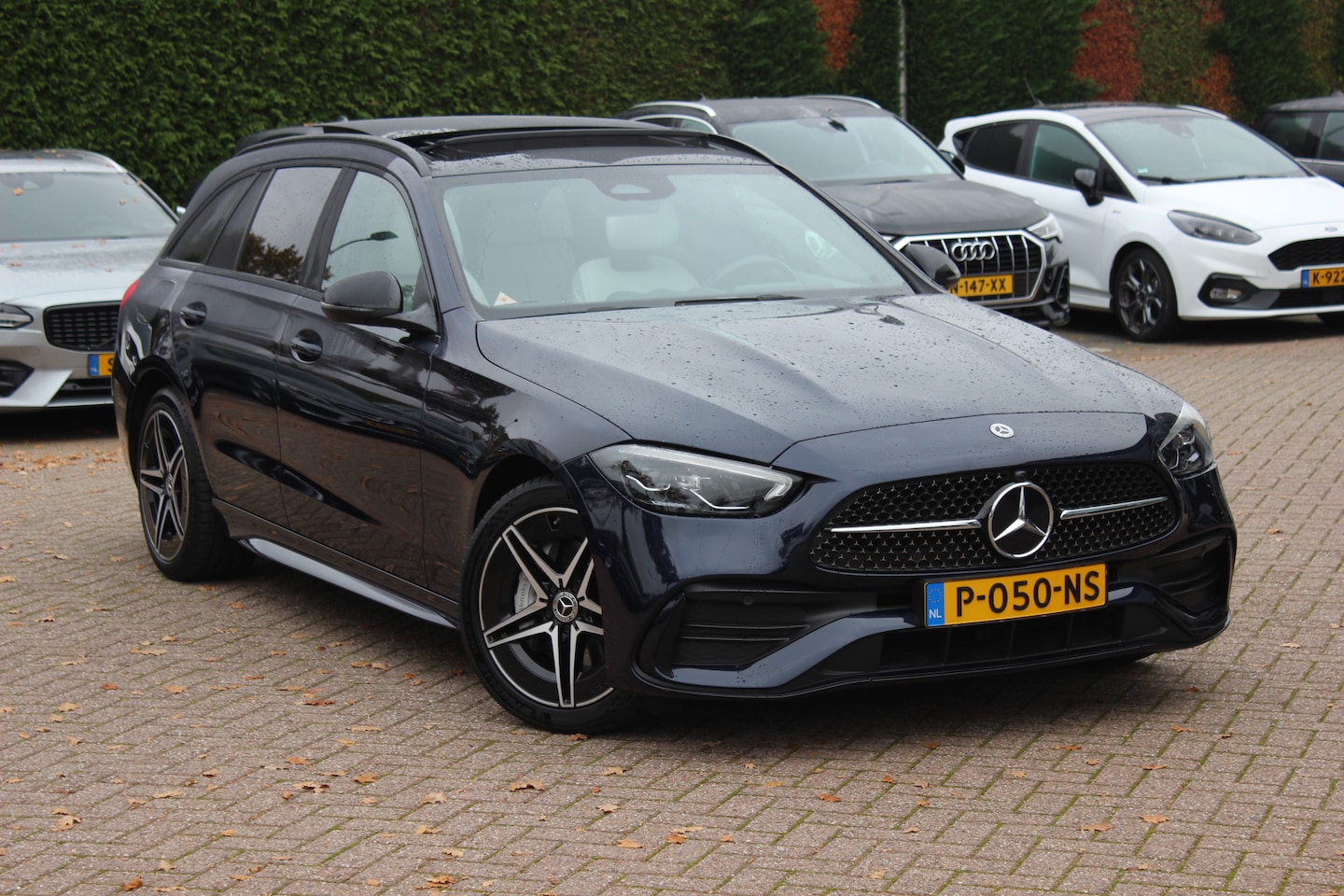 Mercedes-Benz C-klasse Estate - 300 e AMG Line / Panoramadak / Camera / Ivoor Leder / LED / 18'' / CarPlay / DAB / Stoelve - AutoWereld.nl