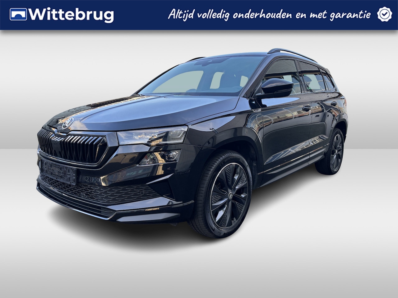 Skoda Karoq - 1.5 TSI 150pk ACT Sportline Sunset DSG Automaat Navigatie / Stoelverwarming V&A / App-conn - AutoWereld.nl