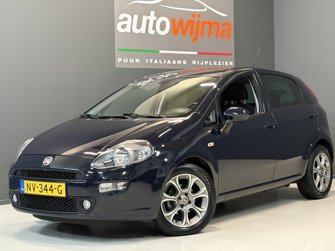 Fiat Punto Evo - 0.9 Turbo 100pk TwinAir Lounge 5Drs. Climate control, Cruise control, Navigatie - AutoWereld.nl