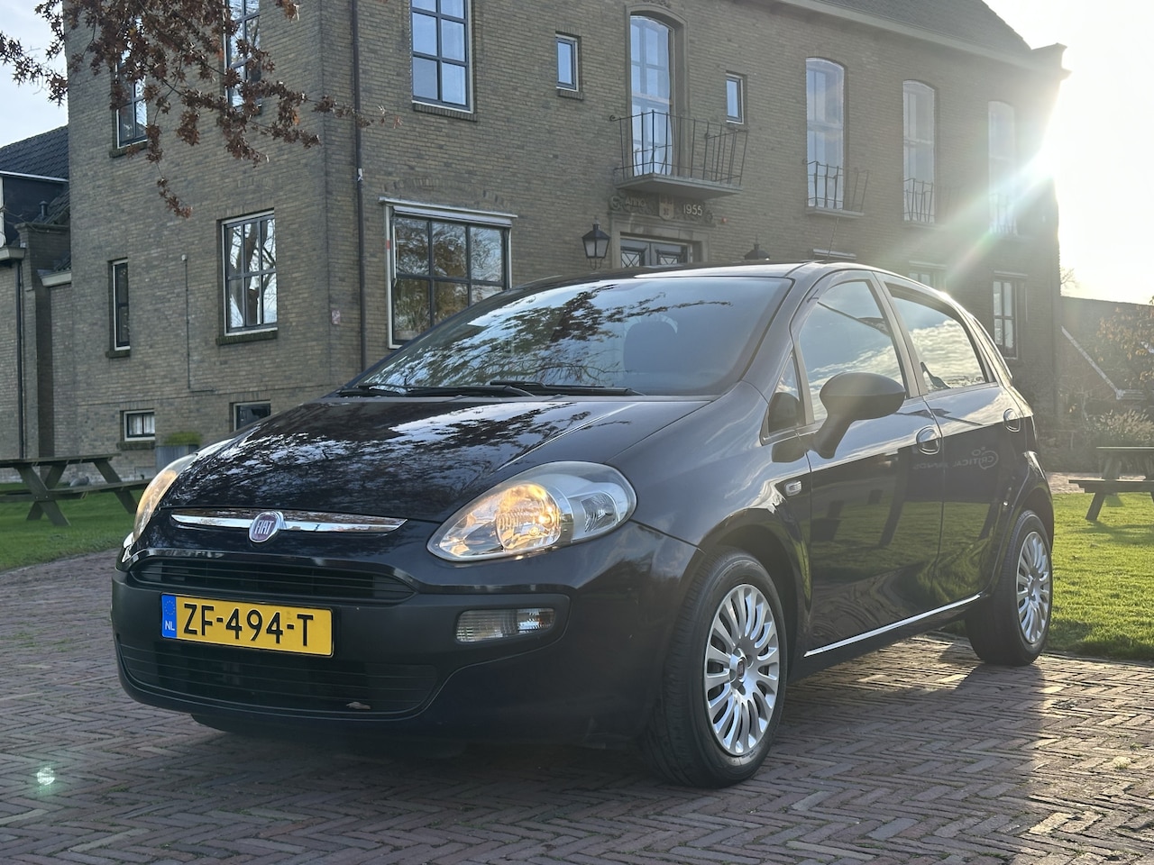 Fiat Punto Evo - 1.2 Pop 5 deurs * airco - AutoWereld.nl