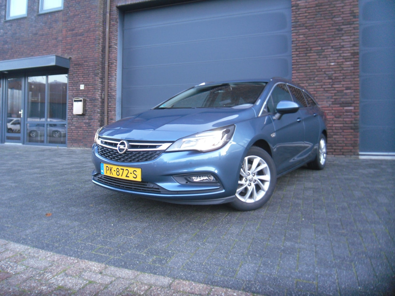 Opel Astra Sports Tourer - 1.0 Innovation 113d KM Nap Camera - AutoWereld.nl