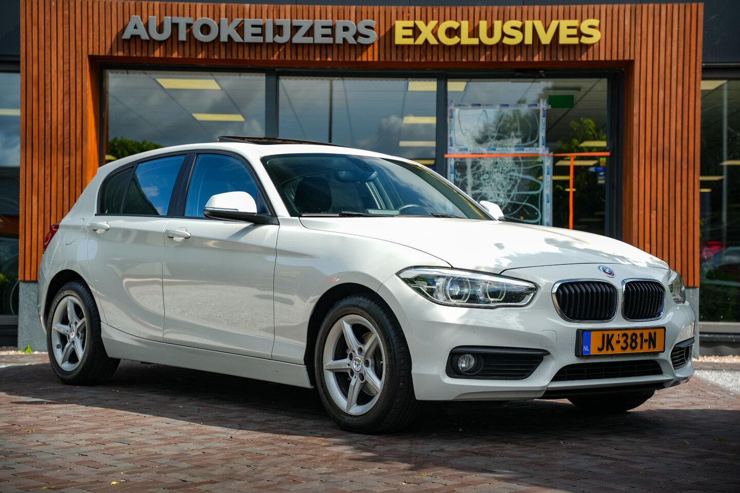 BMW 1-serie - 118i Centennial Executive Schuifdak LED Cruise Clima PDC Navi - AutoWereld.nl