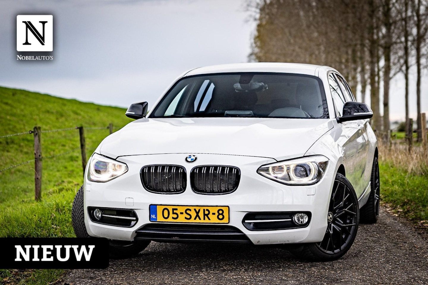BMW 1-serie - 116i Business M-Sport | Nap | 5 Deurs | Carplay - AutoWereld.nl