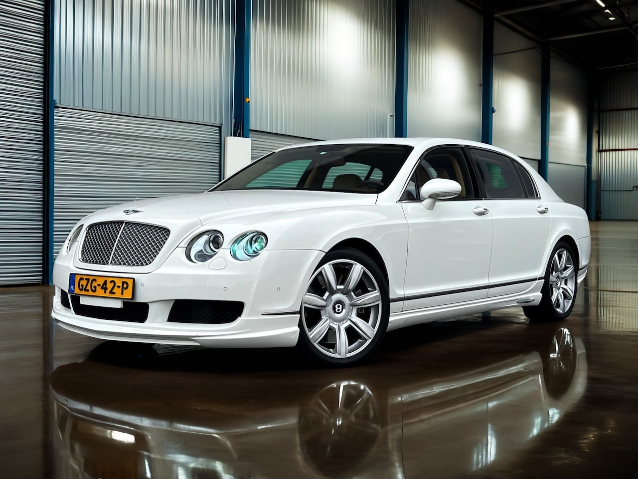 Bentley Continental Flying Spur - 6.0 W12 Carplay_Navi_Xenon_Camera - AutoWereld.nl