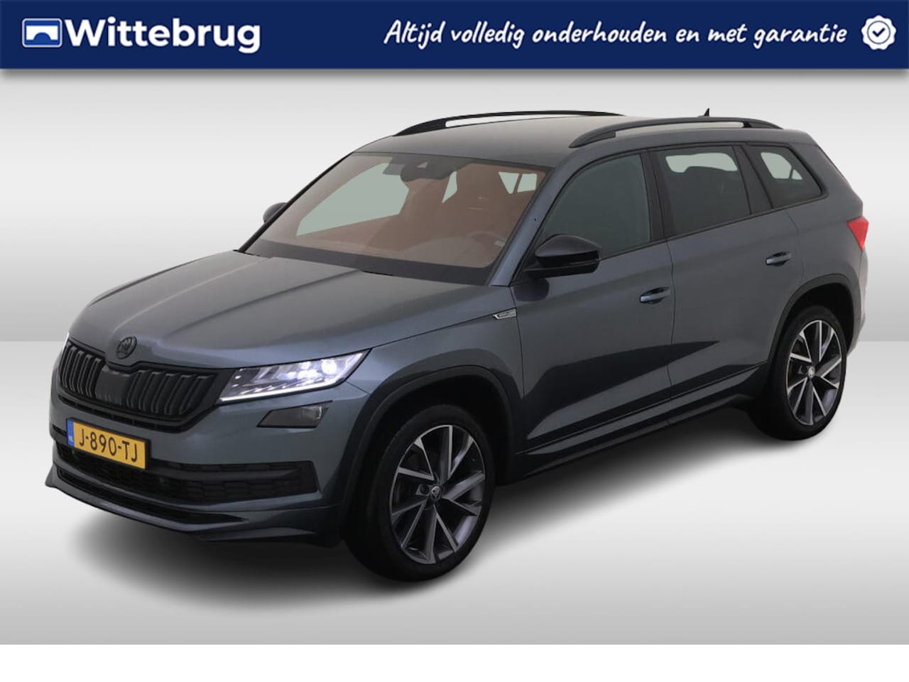 Skoda Kodiaq - 1.5 TSI Sportline Business 7p. / AUTOMAAT/ TREKHAAK/ CAMERA/ PARK. SENSOREN/ ADAPT. CUIRSE - AutoWereld.nl