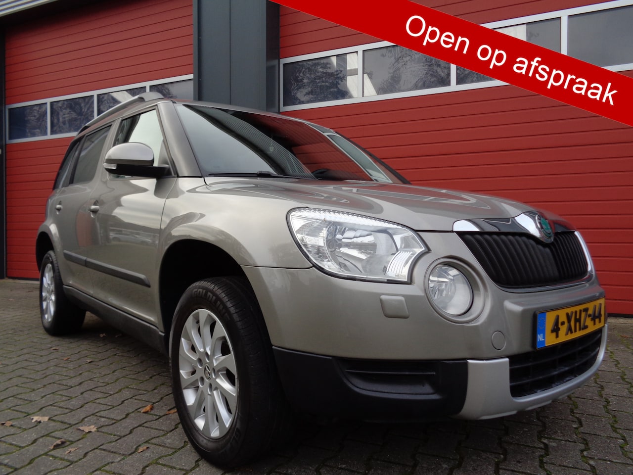 Skoda Yeti - 1.2 TSI Ambition Automaat Clima Cruise Navi Pano-Dak Trekhaak LMV - AutoWereld.nl