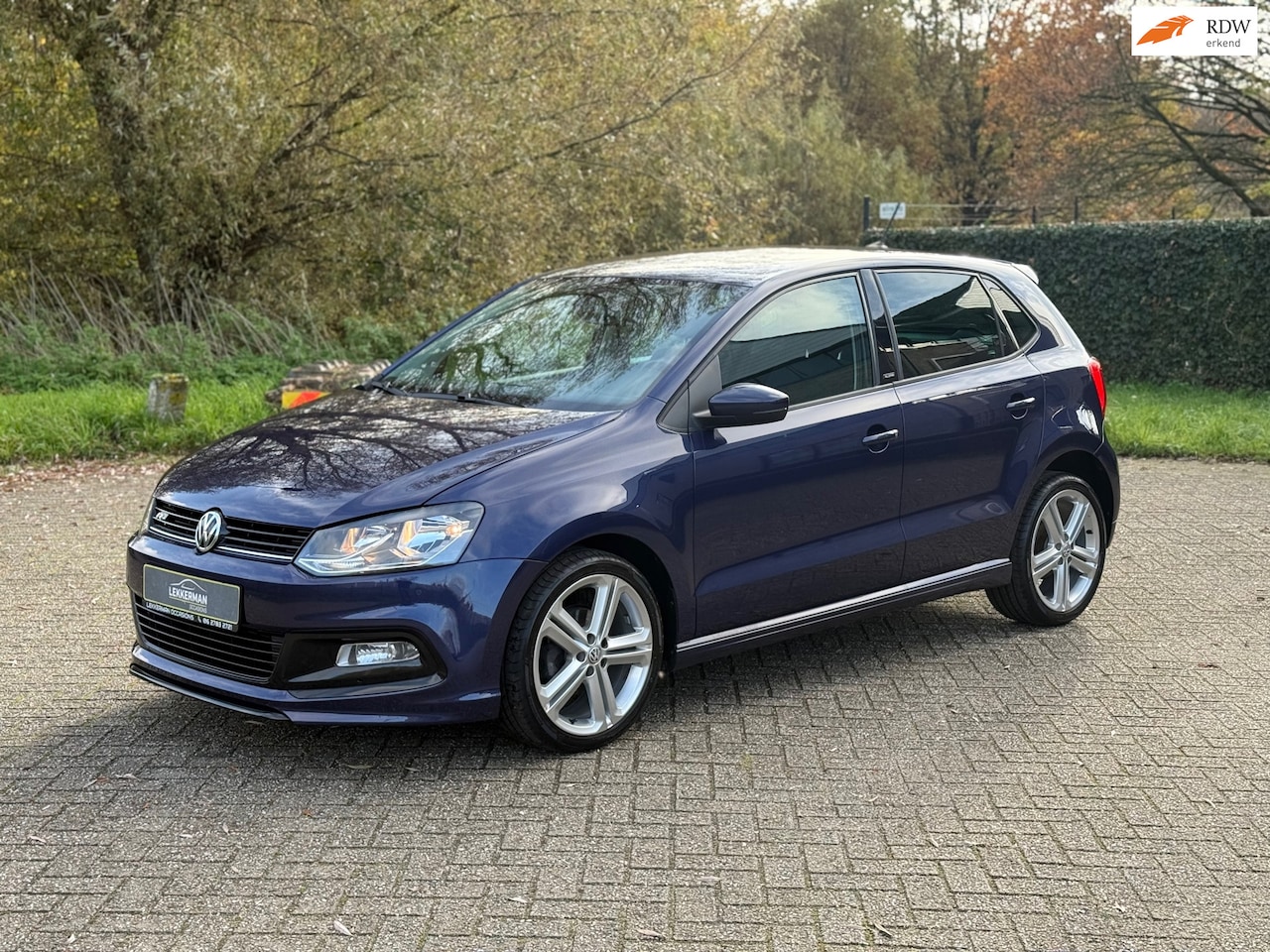 Volkswagen Polo - 1.2 TSI R-LINE U 82117KM I NAVI I PDC I 1E EIG I UNIEK I CLIMA - AutoWereld.nl