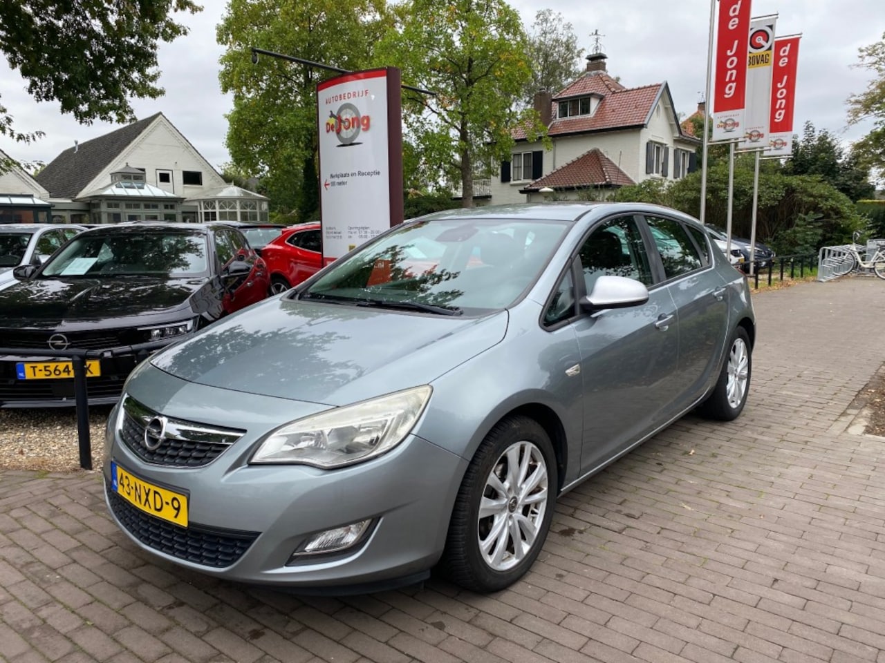 Opel Astra - 1.6 EDITION / AIRCO / CRUISE CTR. / TREKHAAK / 17'' LM-VELGEN - AutoWereld.nl