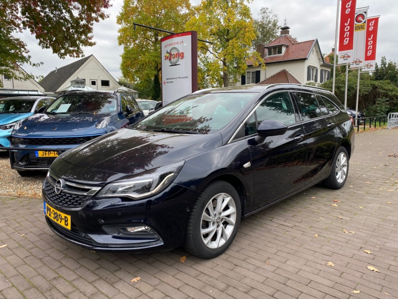 Opel Astra Sports Tourer - SPORTS TOURER 1.6 CDTI BUSINESS EXECUTIVE / TREKHAAK / NAVI - AutoWereld.nl