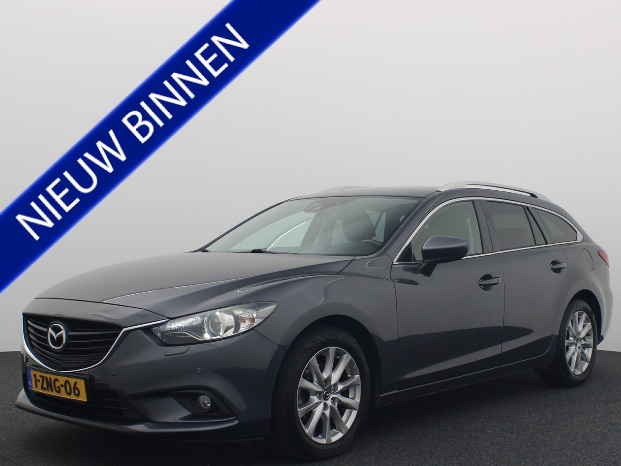 Mazda 6 Sportbreak - 2.0 HP TS+ AUTOMAAT / XENON / STOELVERW / NAVI / CLIMA / PDC / BLUETOOTH / CRUISE / NL-AUT - AutoWereld.nl
