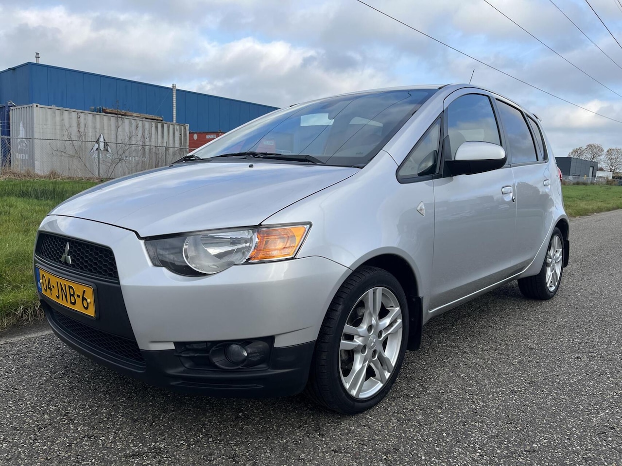 Mitsubishi Colt - 1.3 Intro Edition Airco Cruise PDC - AutoWereld.nl