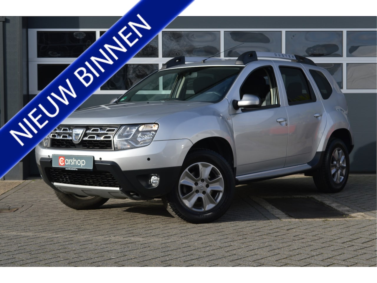 Dacia Duster - 1.2 TCe 4x2 Lauréate | PDC/Airco/Trekhaak | - AutoWereld.nl