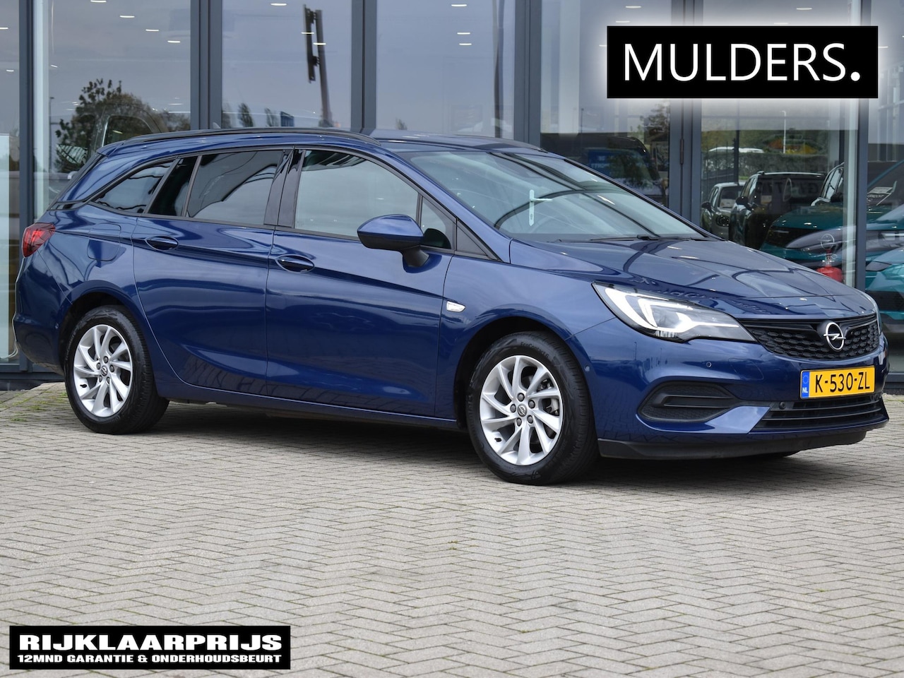 Opel Astra Sports Tourer - 1.2 Elegance CAMERA / TREKHAAK / NAVI - AutoWereld.nl