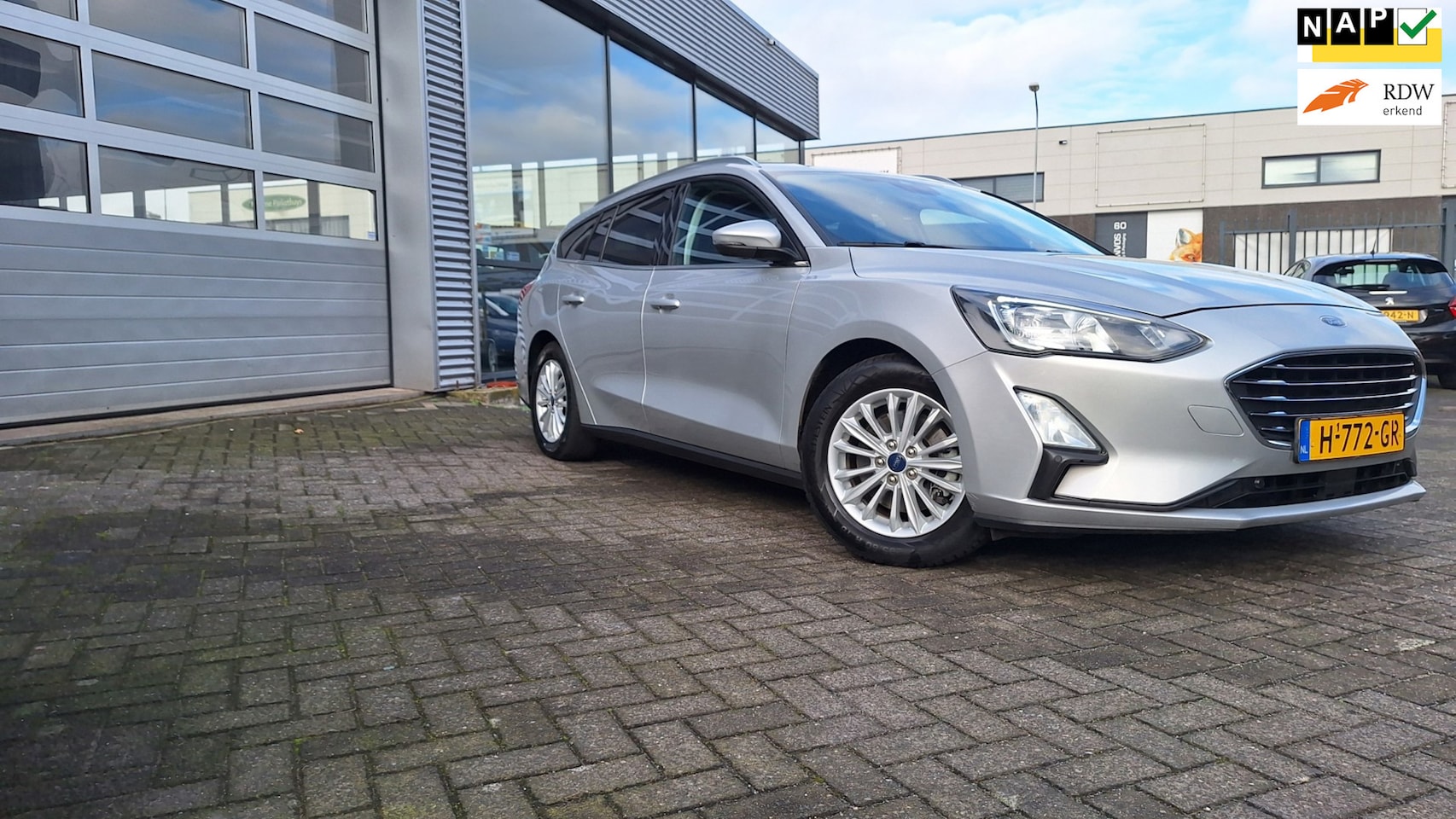 Ford Focus Wagon - 1.0 EcoBoost Titanium Business Automaat/Nav/Cruise/Lm/Enz* - AutoWereld.nl