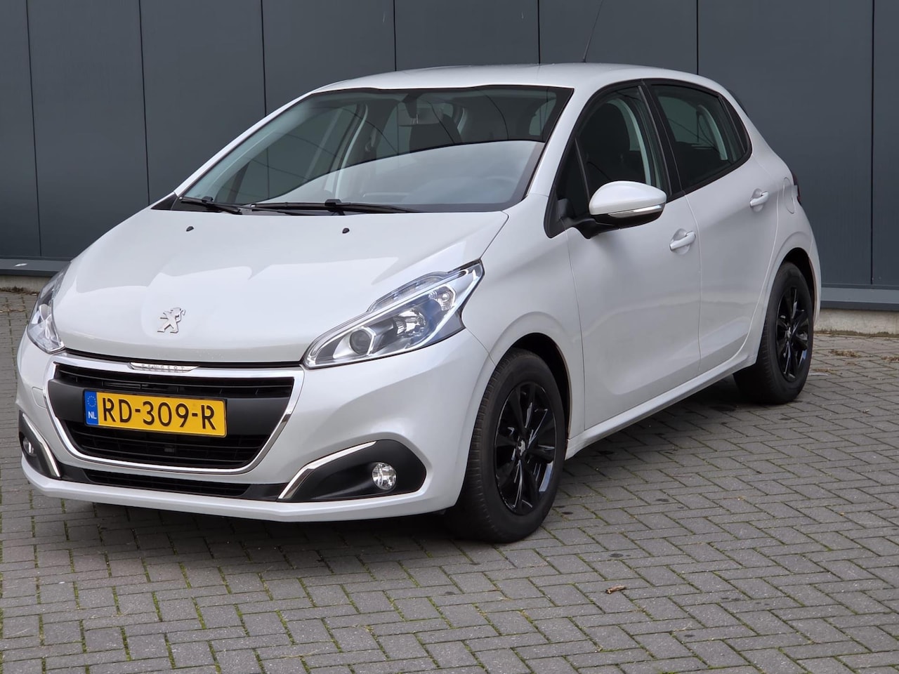 Peugeot 208 - 1.2 PureTech Blue Lion Navi - AutoWereld.nl