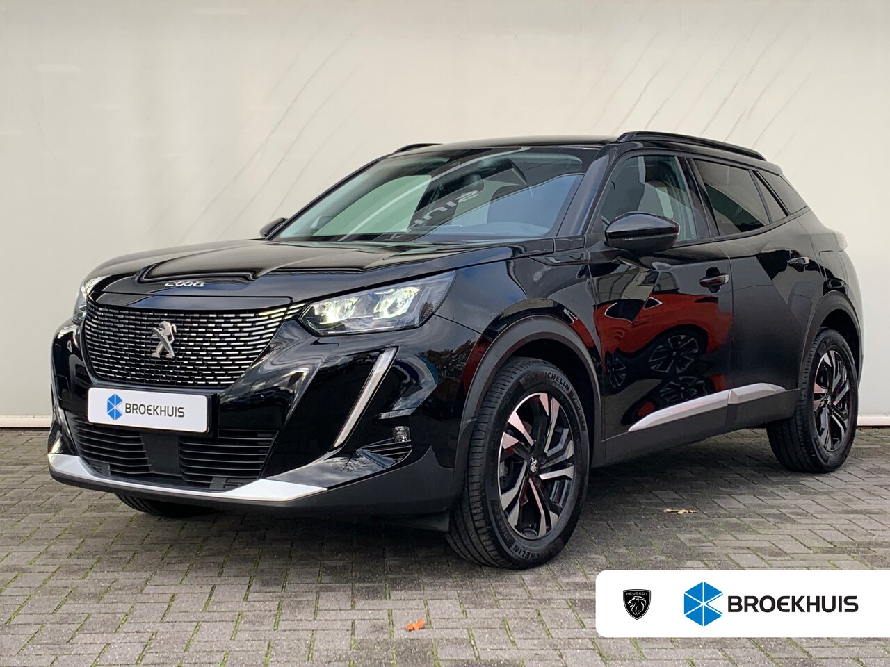 Peugeot 2008 - 1.2 PureTech Blue Lease Allure Airco | Adaptieve Cruise Control | DAB | LED-verlichting | - AutoWereld.nl