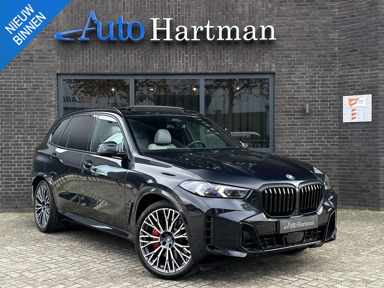 BMW X5 - xDrive50e M-Sport Pro PANO|HARMANKARDON|HEADUP|360CAM|TREKHAAK - AutoWereld.nl