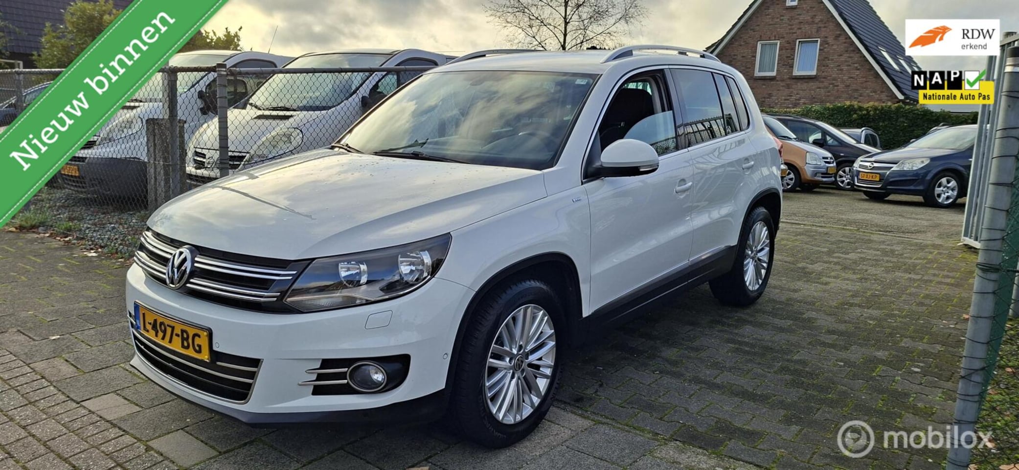 Volkswagen Tiguan - 1.4 TSI Sport&Style - AutoWereld.nl