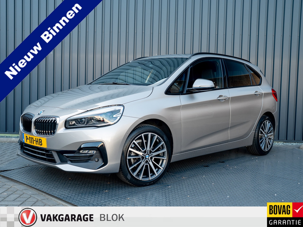 BMW 2-serie Active Tourer - 218i Business Edition Plus | Panodak | Head Up | Trekhaak | Camera | Prijs Rijklaar!! - AutoWereld.nl