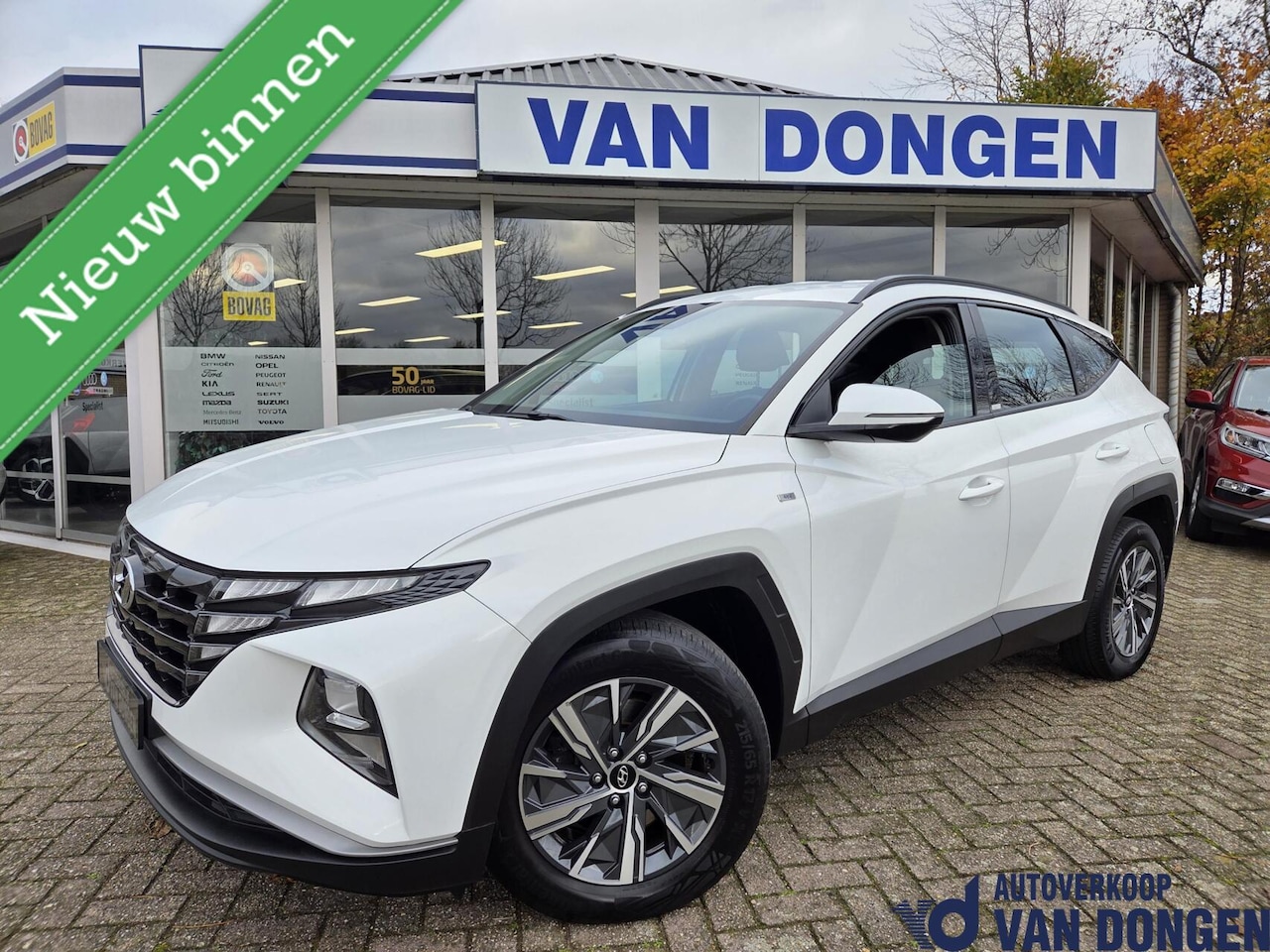 Hyundai Tucson - 1.6 T-GDI MHEV Comfort Smart | Navigatie / Carplay / Camera / Stoelverw. - AutoWereld.nl