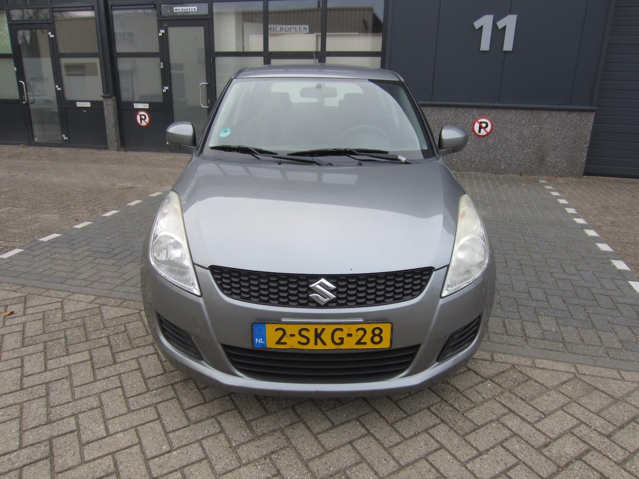 Suzuki Swift - 1.2 Bandit EASSS 2013 Airco Cruise 5-Deurs NAP! APK! - AutoWereld.nl