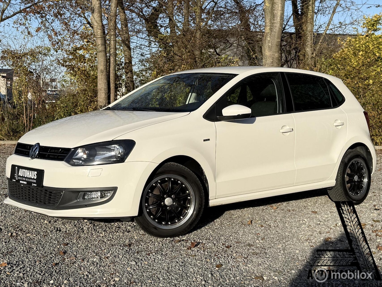 Volkswagen Polo - 1.2 Highline Style CarPlay PDC Cruise - AutoWereld.nl