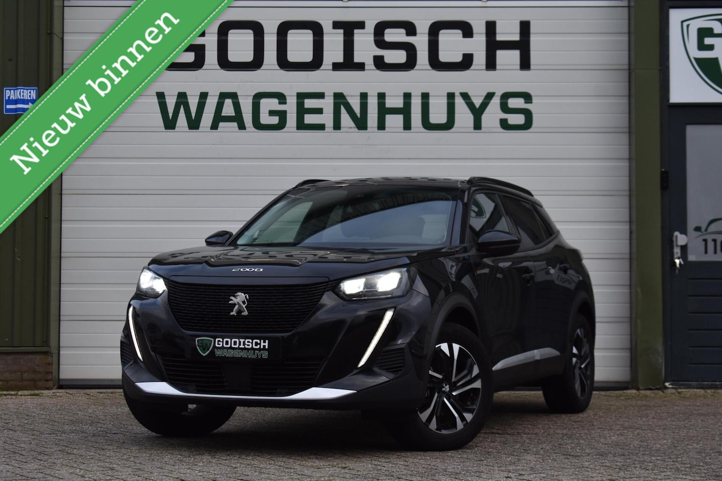 Peugeot e-2008 - EV Allure Pack 50 kWh | Camera | Trekhaak | 100% Onderhouden | - AutoWereld.nl
