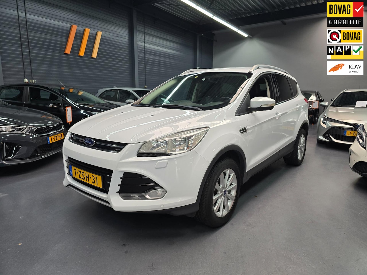 Ford Kuga - 1.5 Titanium CAMERA LEDER KEYLESS PARK ASSIST NAP NL AUTO - AutoWereld.nl