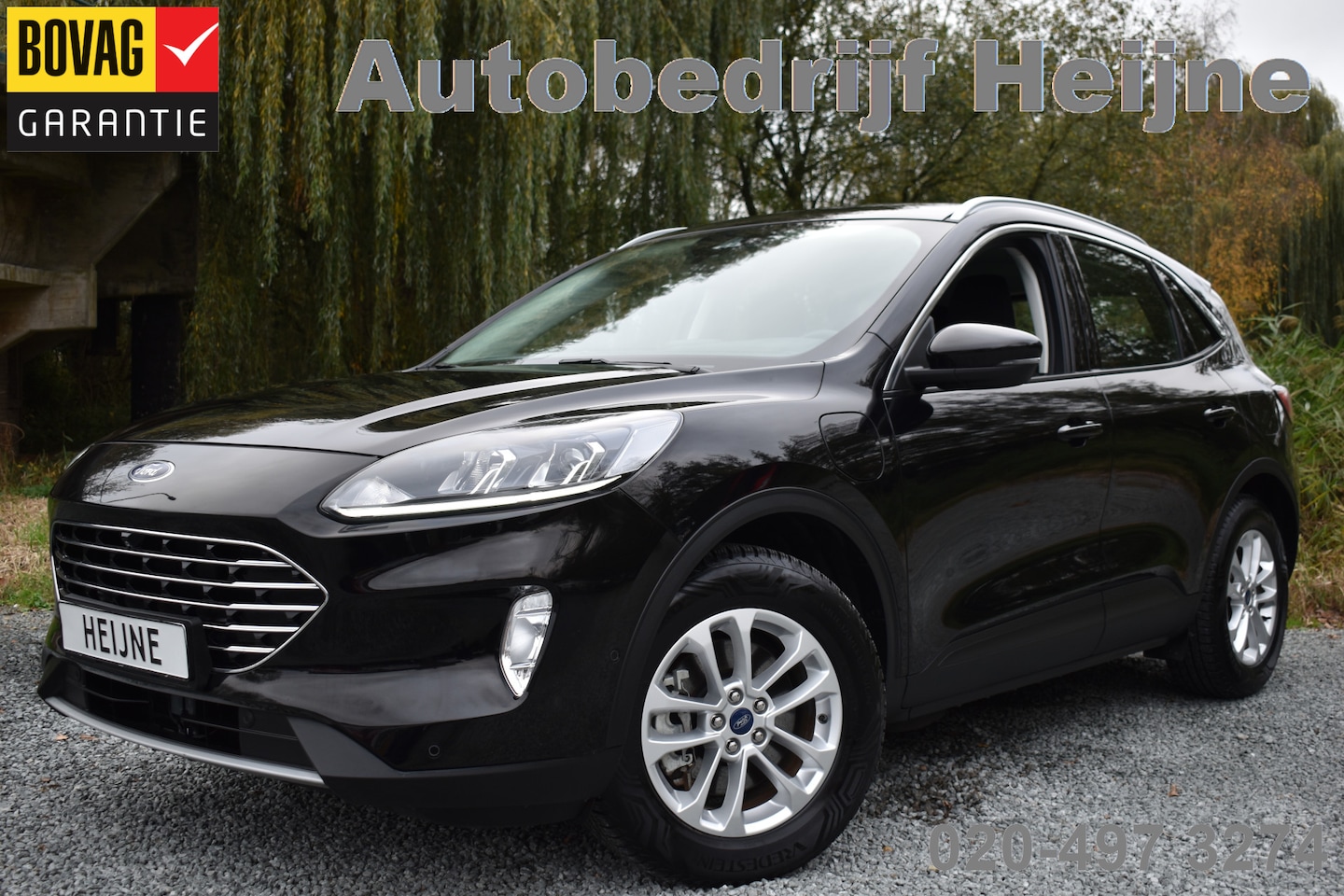 Ford Kuga - 2.5 PHEV 225PK AUT. TITANIUM TREKHAAK/NAVI/CAMERA - AutoWereld.nl