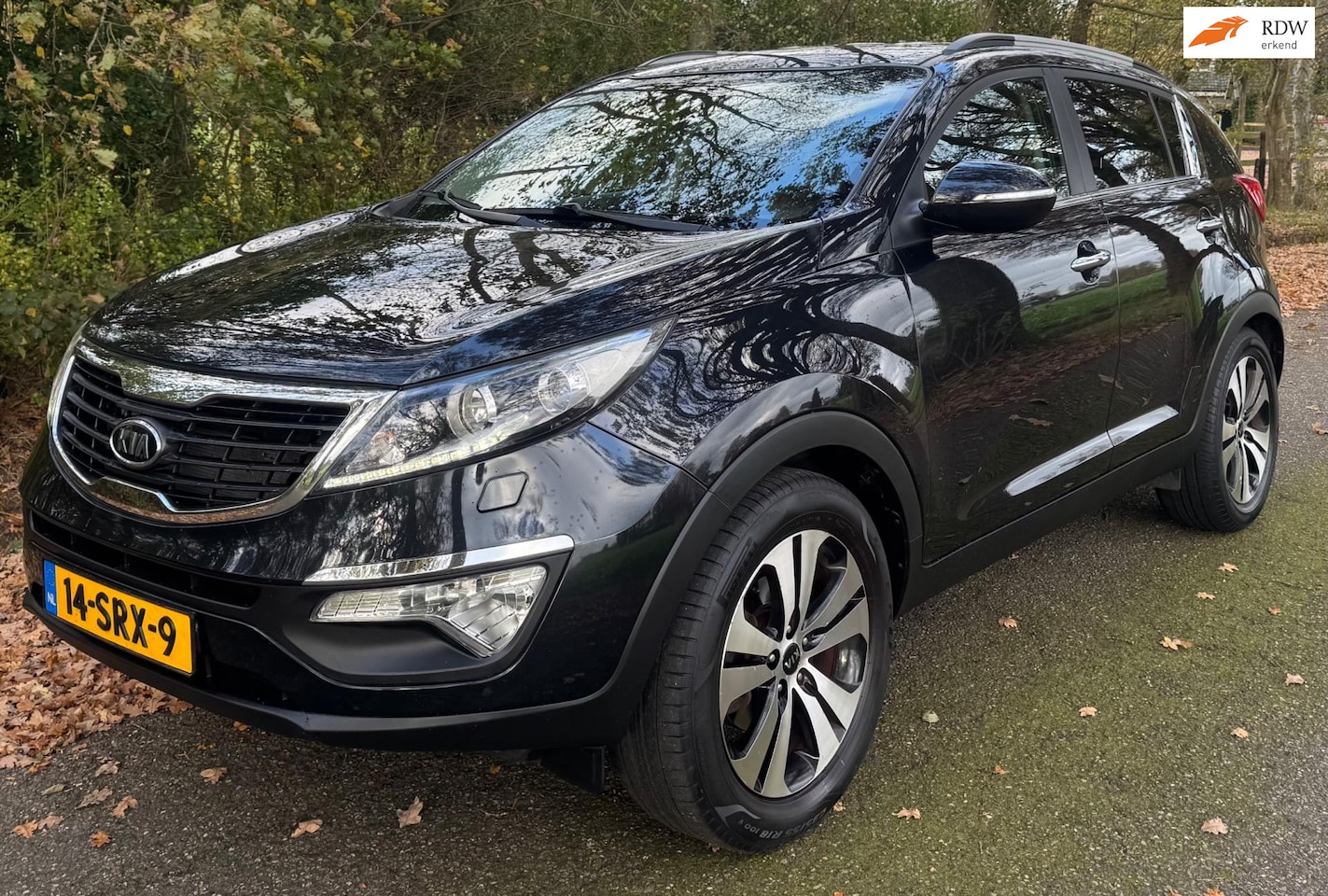 Kia Sportage - 2.0 X-clusive 2012 NAVI CLIMA CRUISE NAP 1900KG TREK GEWICHT ERG FIJNE AUTO - AutoWereld.nl