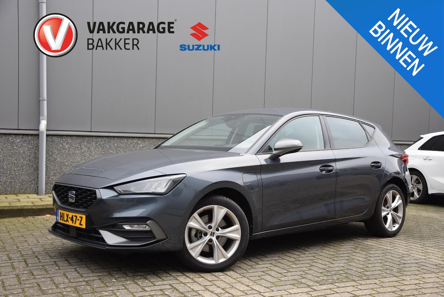 SEAT Leon Sportstourer - 1.4 TSI eHybrid PHEV FR | SOH 100%| stuurwiel verwarmd | lederen/stof bekleding | - AutoWereld.nl