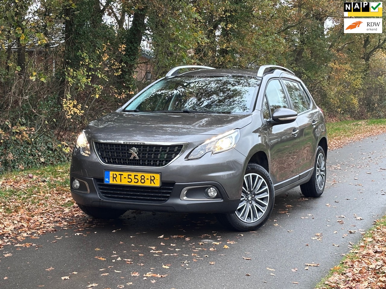 Peugeot 2008 - 1.2 PureTech Blue Lion | "112.000" KM NAP + Cruise Nu € 8.450,-!!! - AutoWereld.nl